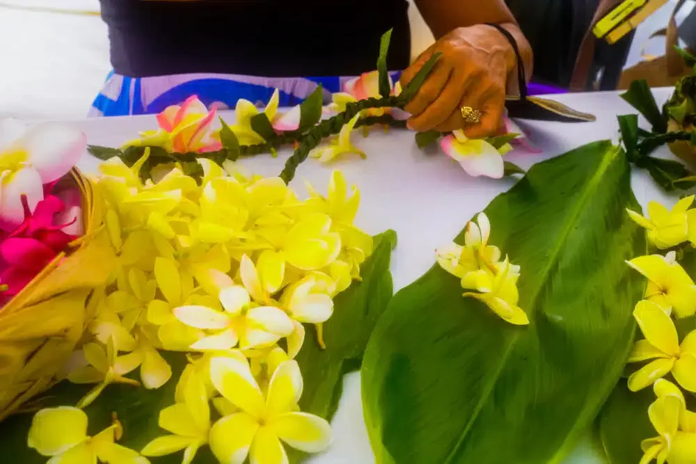 Making leis in hawaii