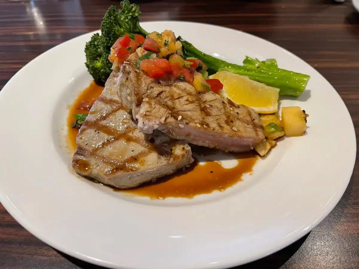 Tuna Entree with Broccoli topped with Pineapple Pico de Gallo Sauce.