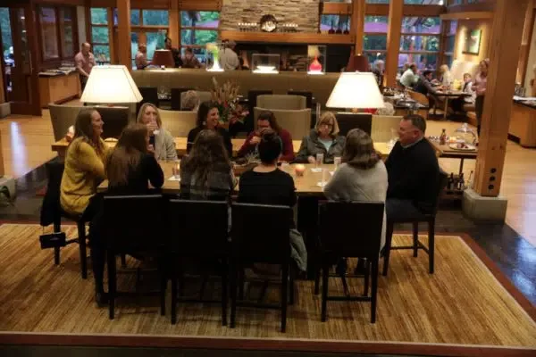 A group having dinner at the Copperleaf Restaurant.