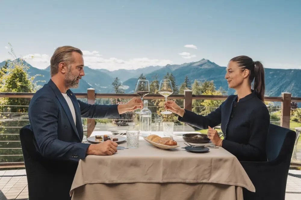 Couple have dinner outside