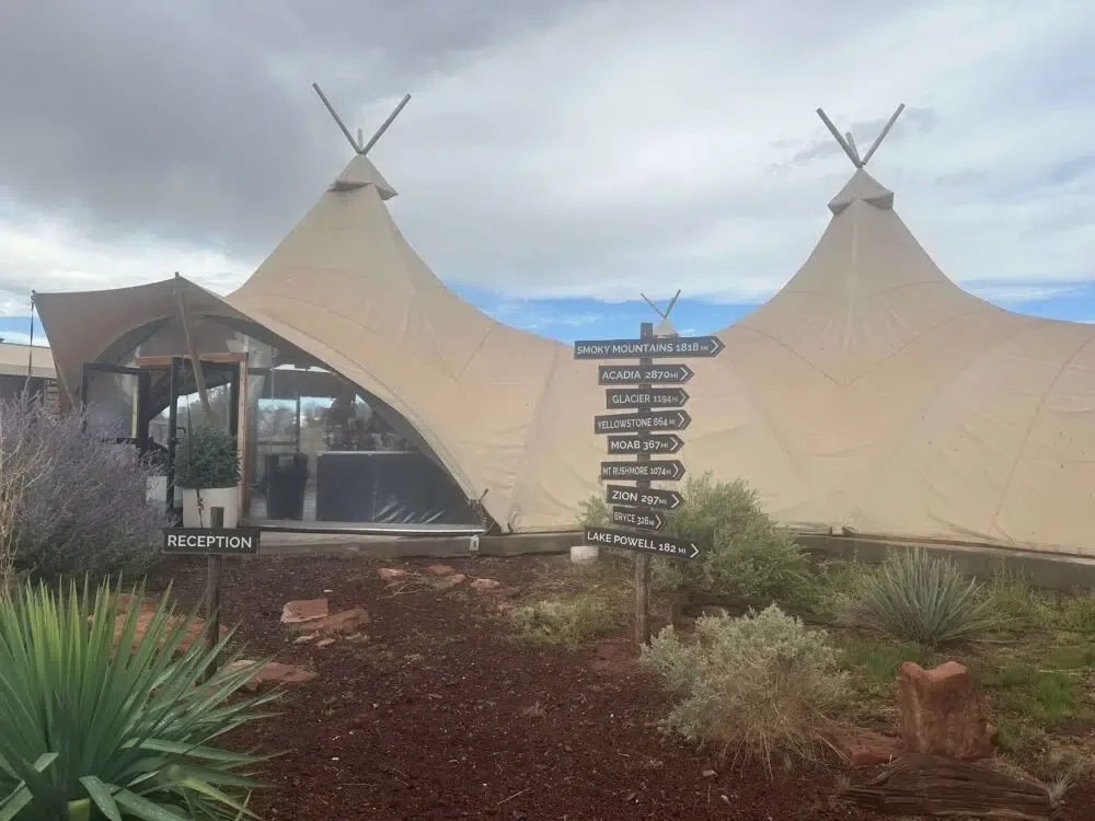 The Under Canvas reception tent under an afternoon monsoon. Credit: Geri Koeppel