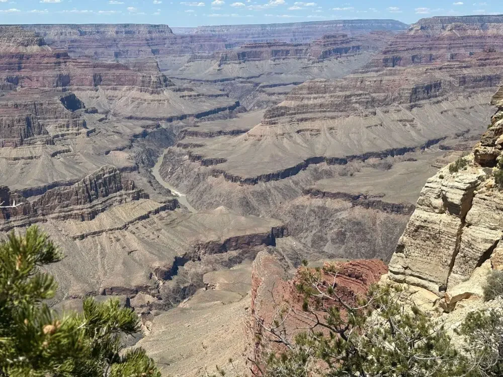 looking into the grand canyon with the colorado river at the bottom