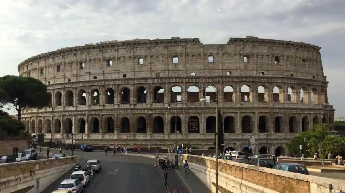 While cycling in Rome, we passed the Roman Colosseum.