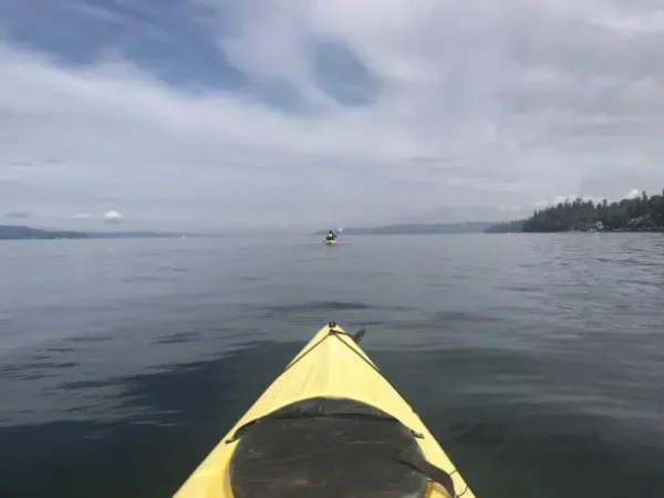 View of Puget Sound from the front of a yellow kayak south of Seattle